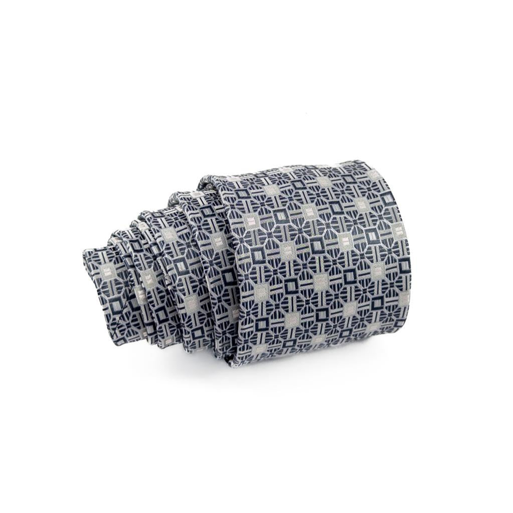 Corbata Gris con Patrón Geométrico – Sofisticación y Modernidad